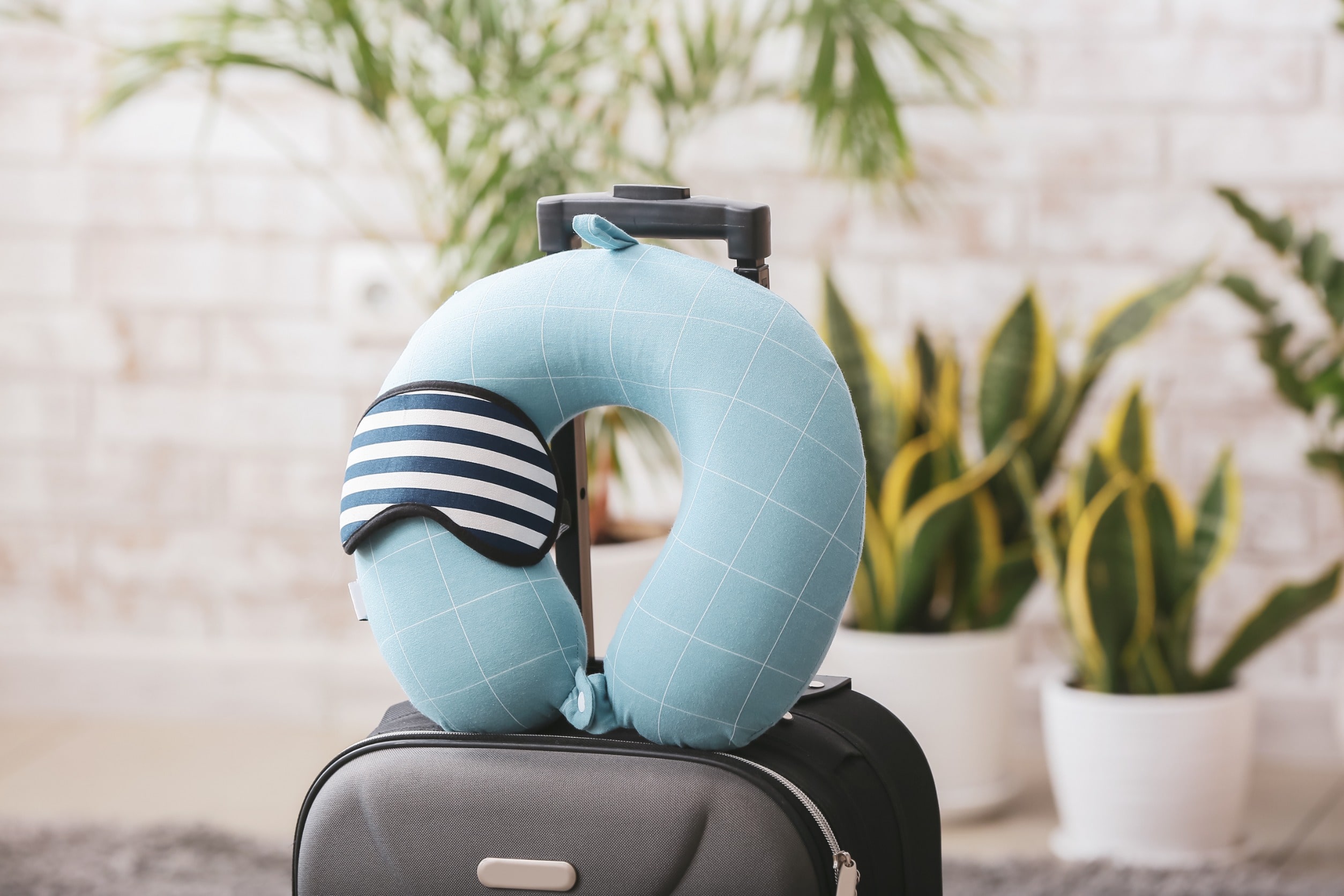 A neck pillow, an ideal accessory to have when waiting at the airport.